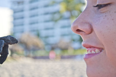 Close-up portrait of smiling mid adult man