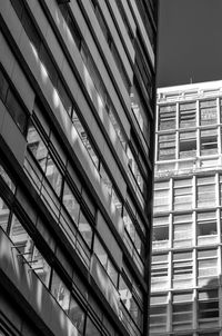 Low angle view of modern building in city against sky