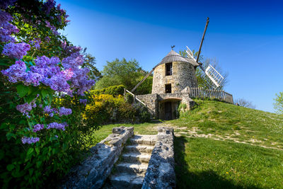 La sallette windmill and springtime flowers, tarn, france