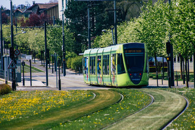 Train on railroad track in city