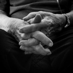 Close-up of man holding hands