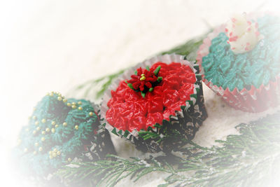 Close-up of cupcakes on table during christmas