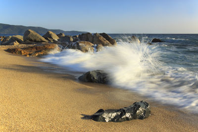 Waves breaking at shore