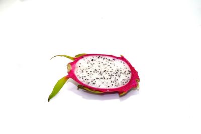 Close-up of strawberry over white background