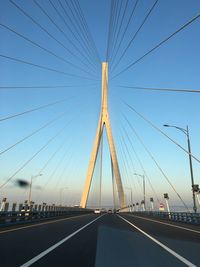 Incheon bridge against clear sky in city