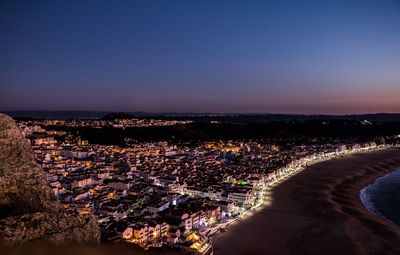 High angle view of city at sunset