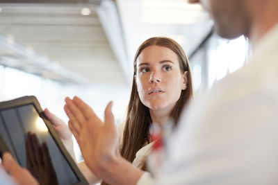 Portrait of woman using mobile phone