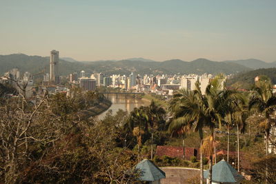 Panoramic shot of trees and mountains against sky