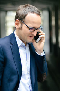 Young man using mobile phone