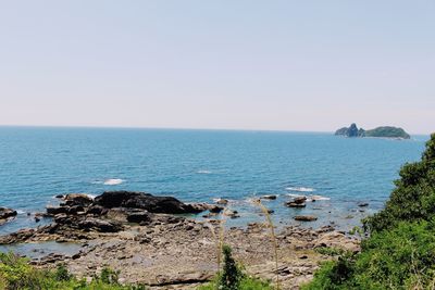 Scenic view of sea against clear sky