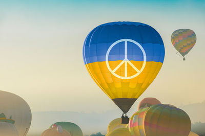 Hot air balloons against sky