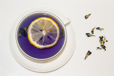 High angle view of lemon slice on table