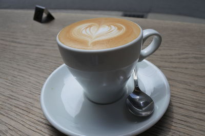 Close-up of cappuccino on table