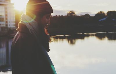 Silhouette of woman at sunset