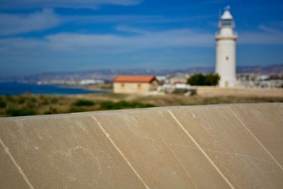 Roof against lighthouse in city