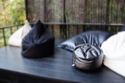 Close-up of sunglasses on table by window