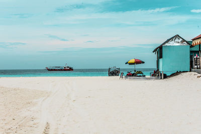 Scenic view of beach against sky