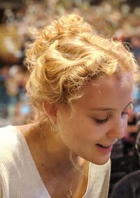 Close-up portrait of a smiling young woman