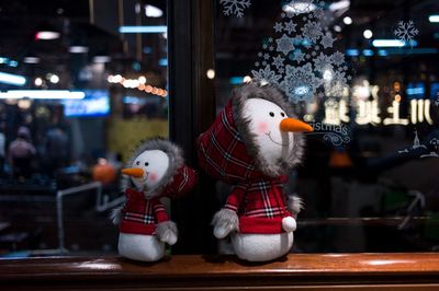 Close-up of snowman toys on table