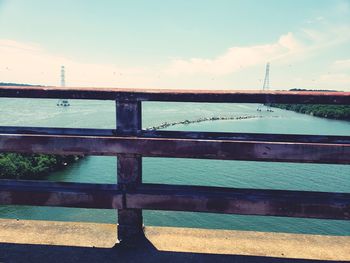 Bridge over river against sky