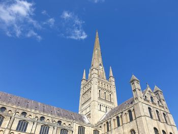 Low angle view of building against blue sky