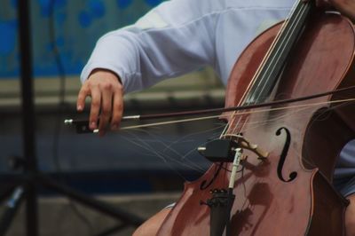 Close-up of person playing violin