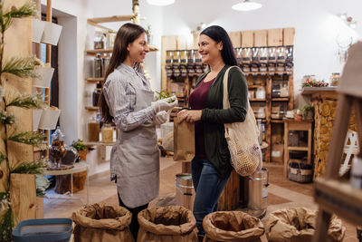 Woman standing at store