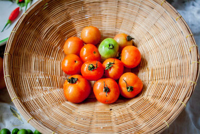 Close-up of tomatoes in basket