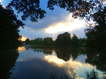 Scenic view of lake against sky during sunset