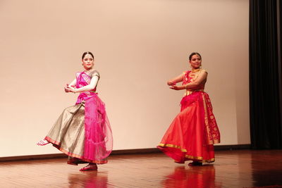 Woman standing in traditional clothing