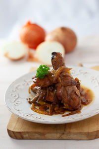 Close-up of meat in plate on table