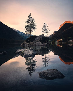 Scenic view of lake against sky during sunset