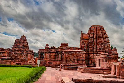 Pattadakal temple complex group of monuments breathtaking stone art with dramatic sky