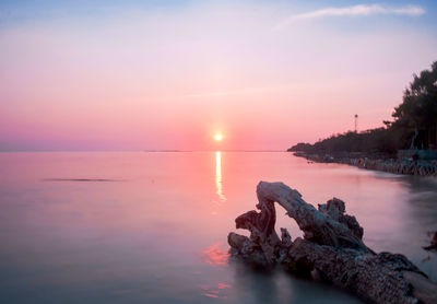 Scenic view of sea against sky during sunset