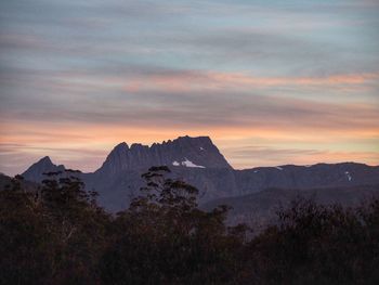 Scenic view of mountains at sunset