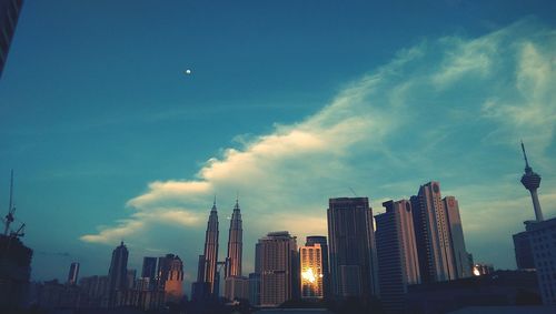 Low angle view of modern buildings against sky