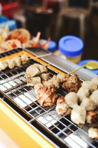 Close-up of meat on barbecue grill