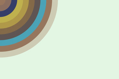 Low angle view of multi colored pencils against sky