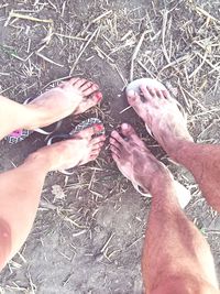 Low section of woman standing on tiled floor