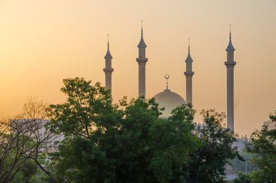 National mosque of abuja against sky during sunset