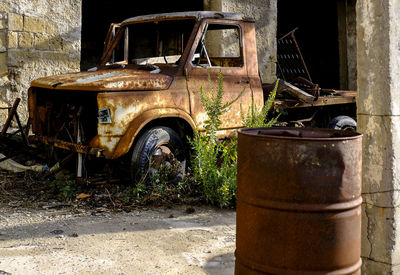 Old rusty car in park