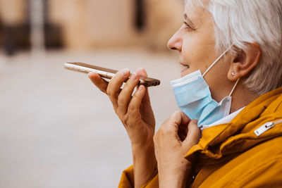 Young woman using mobile phone