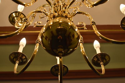 Low angle view of illuminated chandelier