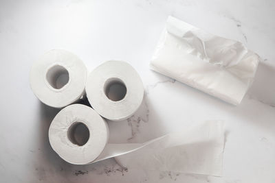 High angle view of papers on white table