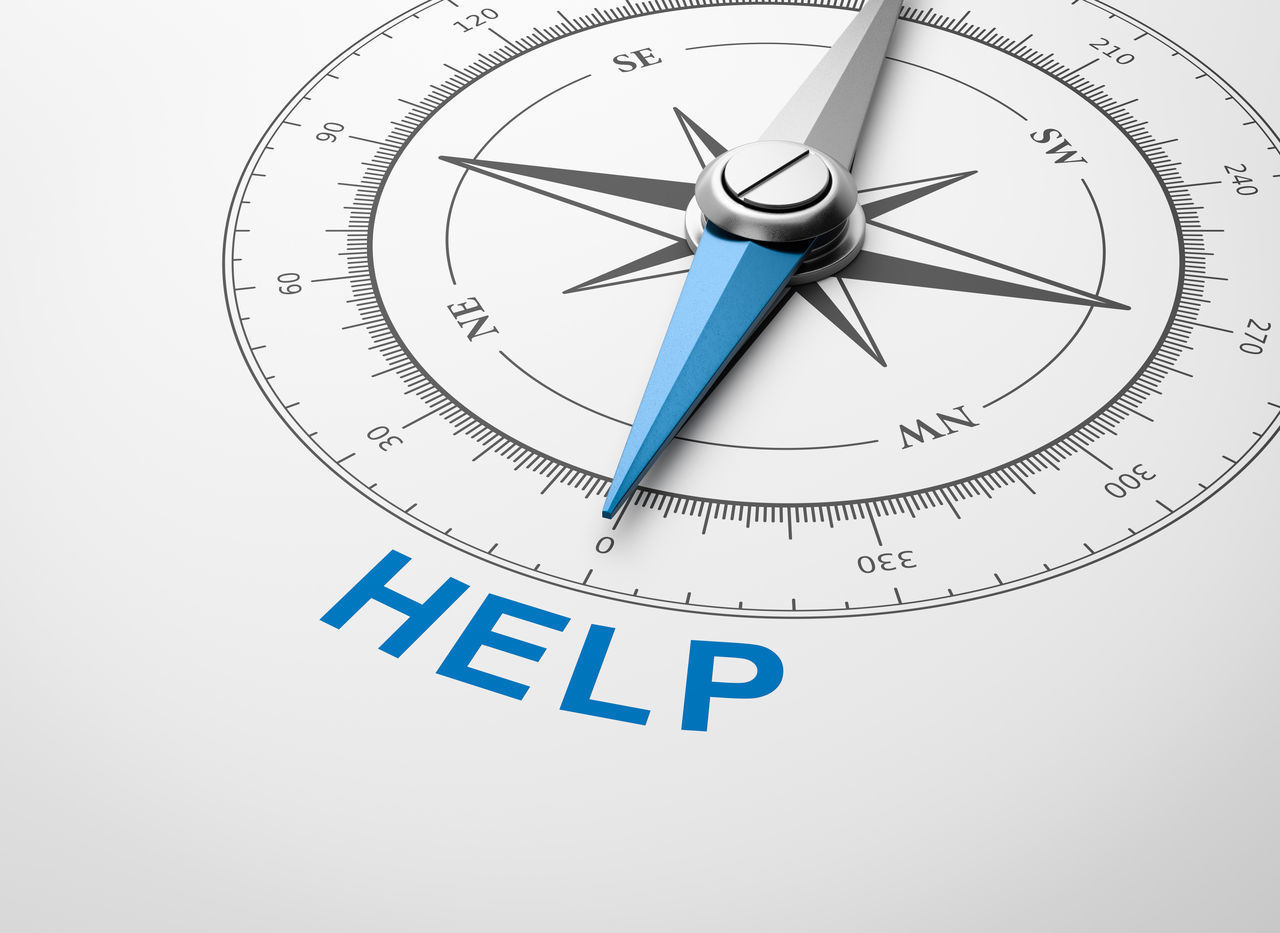 LOW ANGLE VIEW OF CLOCK ON WHITE BACKGROUND