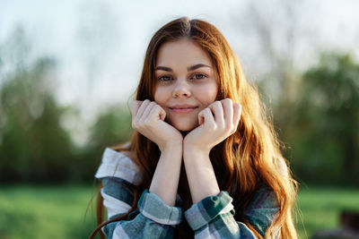 Portrait of young woman looking away