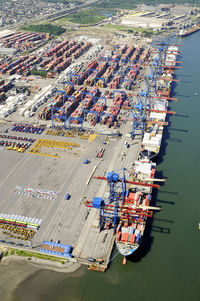 High angle view of commercial dock by sea