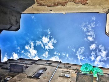 Low angle view of built structure against blue sky