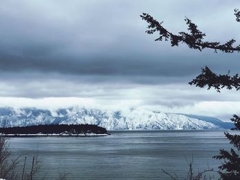 Scenic view of sea against sky during winter