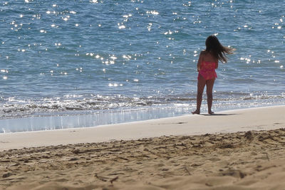 People standing on beach